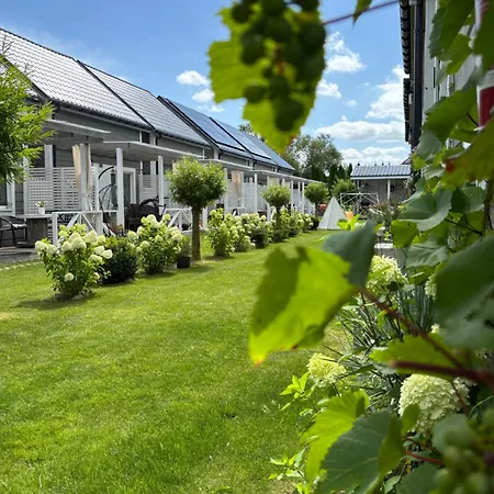 펜션 Kwiatowe 로고보